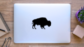 Silhouette Of Buffalo Sticker on a Laptop (New) example