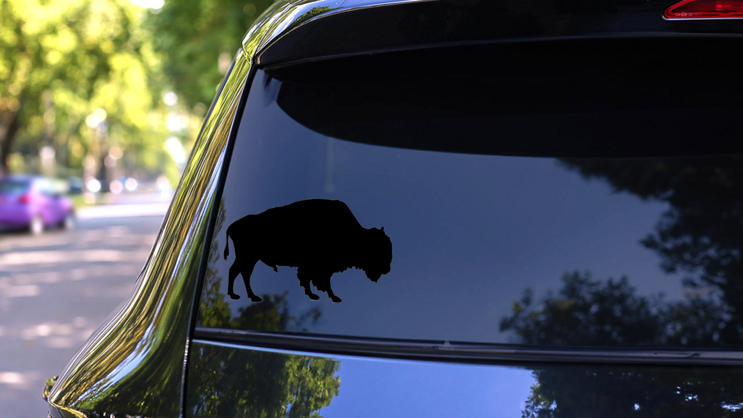 Silhouette Of Buffalo Sticker on a Rear Car Window (New) example