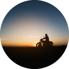 Silhouette Of Young Man Biker With Sunset Sticker