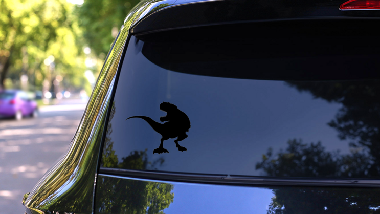 Silhouette T Rex Dinosaur Sticker on a Rear Car Window (New) example