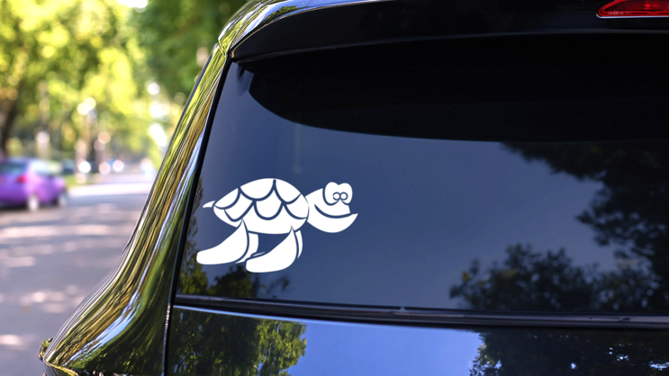 Silly Swimming Turtle Sticker on a Rear Car Window (New) example