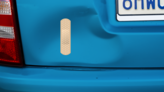Simple Band Aid Bandage Sticker on a Dented Car example