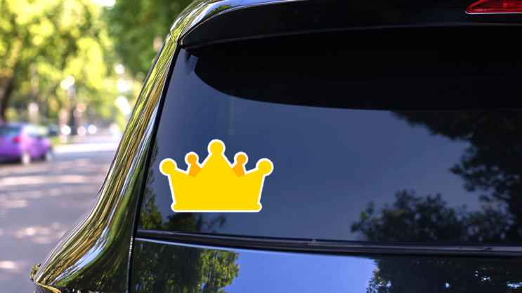 Simple Cartoon Gold Crown Sticker on a Rear Car Window (New) example