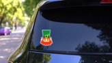 Simple Cartoon Leprechaun Sticker on a Rear Car Window (New) example