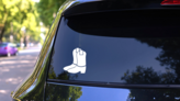 Simple Cowboy Boots Sticker on a Rear Car Window (New) example