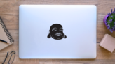 Simple Laughing Buddha Sticker on a Laptop (New) example