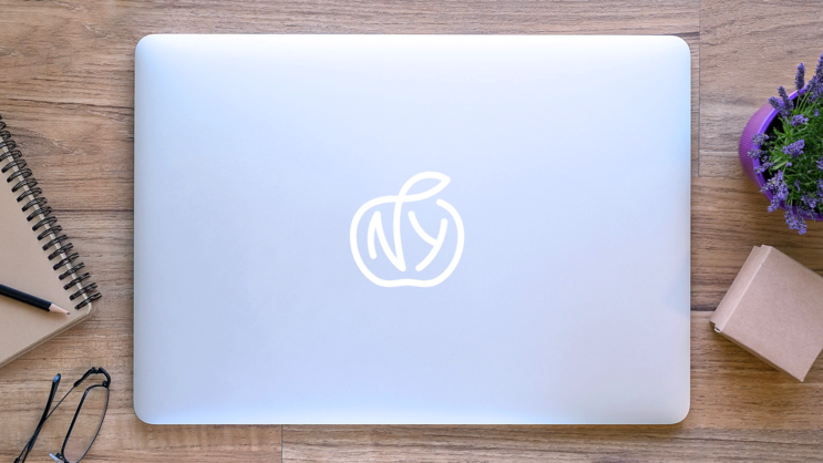 Simple New York Big Apple Sticker on a Laptop (New) example