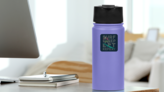 Skeleton Surfing Sticker on a Water Bottle (New) example