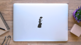 Skeleton Woman Sticker on a Laptop (New) example