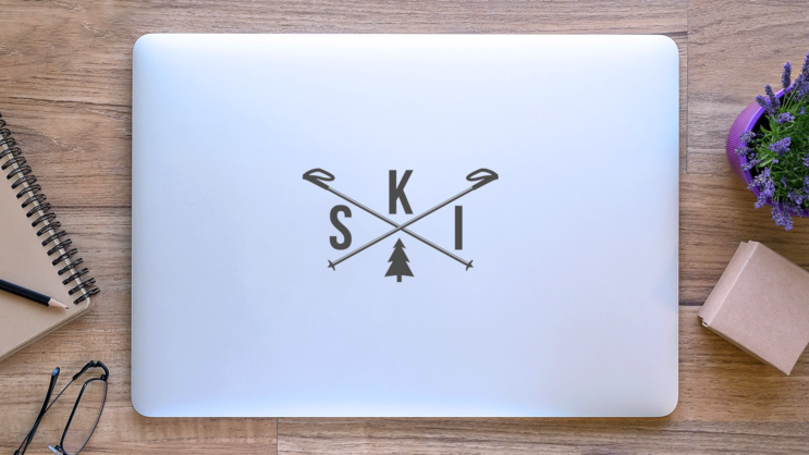 Ski with Crossed Poles Sticker on a Laptop (New) example