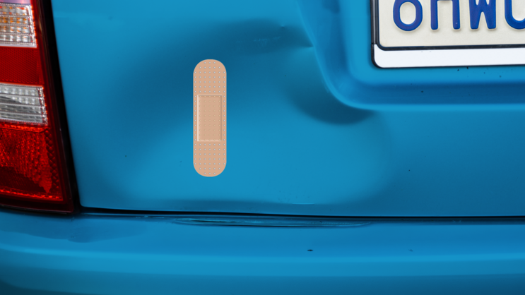 Skinny Band Aid Bandage Sticker on a Dented Car example