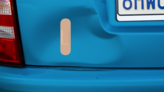 Skinny Band Aid Bandage Sticker on a Dented Car example