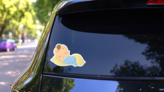 Sleeping Baby Boy Sticker on a Rear Car Window (New) example