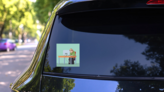 Sloth Sleeping At Work Sticker on a Rear Car Window (New) example