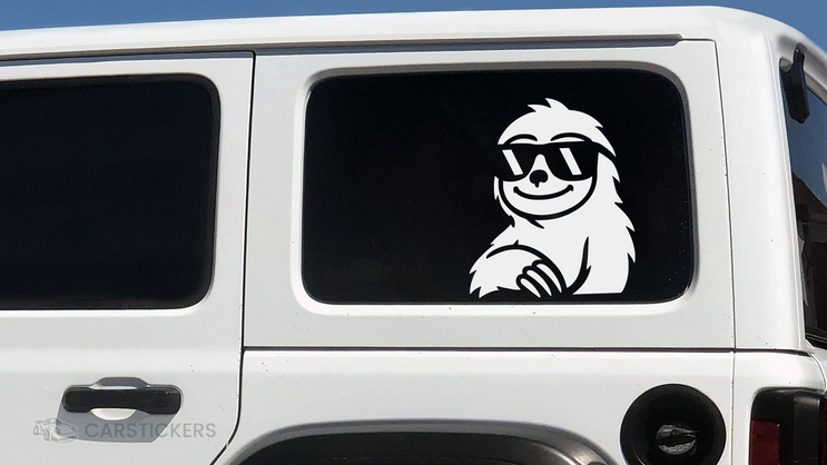 A white transfer decal on the side of a jeep