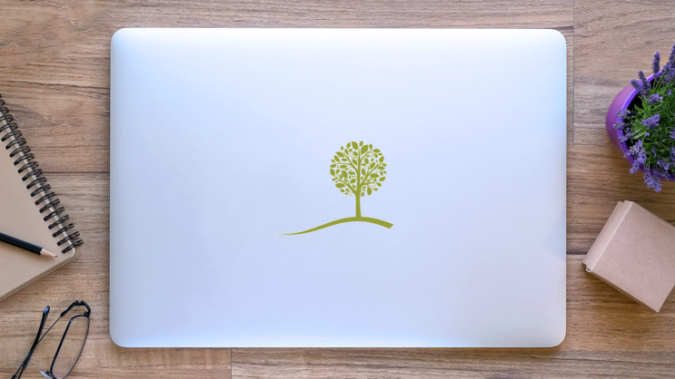 Small Tree On A Hill Sticker on a Laptop (New) example
