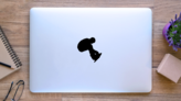 Snowboarder Grabbing Board Sticker on a Laptop (New) example