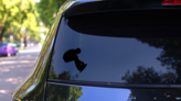 Snowboarder Grabbing Board Sticker on a Rear Car Window (New) example
