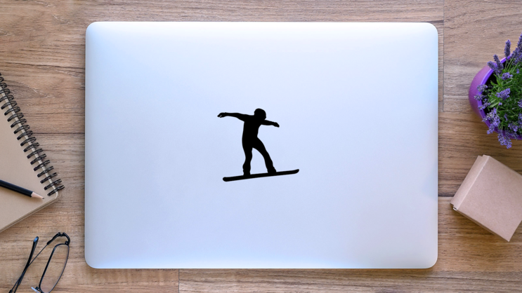 Snowboarding Rider Silhouette Sticker on a Laptop (New) example