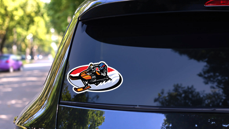 Snowmobile Oval Sticker on a Rear Car Window (New) example