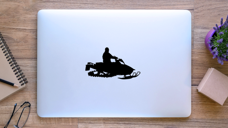 Snowmobile Silhouette Sticker on a Laptop (New) example