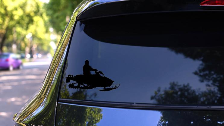 Snowmobile Silhouette Sticker on a Rear Car Window (New) example