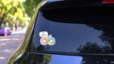 So Sweet Two Donuts Cartoon Sticker on a Rear Car Window (New) example