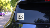 Soccer Ball Coming In Cracked Wall Sticker on a Rear Car Window (New) example