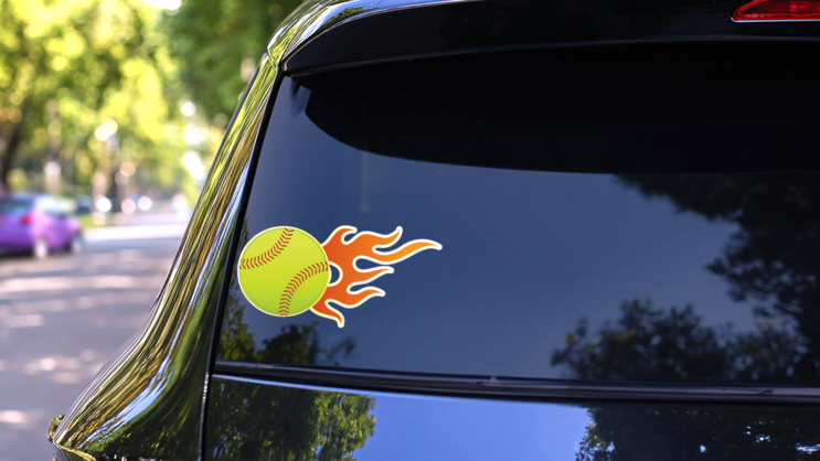 Softball With Short Flames Sticker on a Rear Car Window (New) example