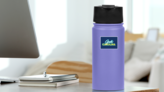 South Carolina Blue And Yellow Logo Sticker on a Water Bottle (New) example