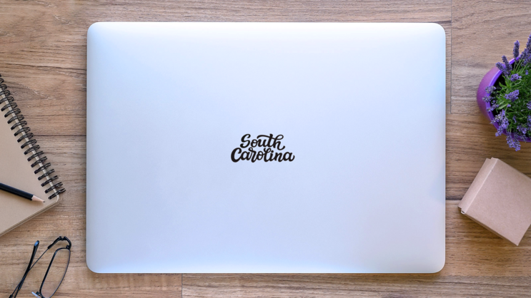 South Carolina Hand Drawn Modern Calligraphy Sticker on a Laptop (New) example