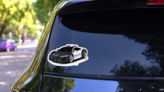 Sports Car Police Cruiser Sticker on a Rear Car Window (New) example