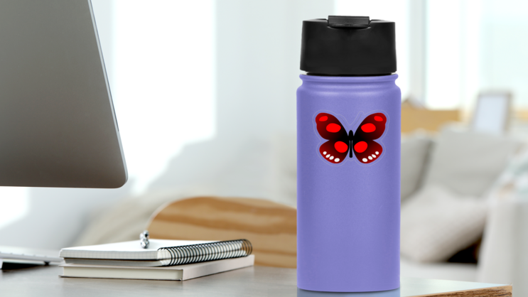 Spotted Red Butterfly Sticker on a Water Bottle (New) example