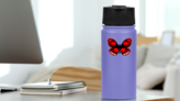 Spotted Red Butterfly Sticker on a Water Bottle (New) example