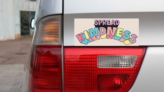 Spread Kindness Bumper Sticker on a Gold Car Rear Bumper example