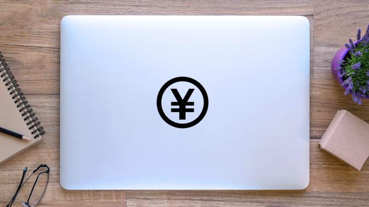 Standard Yen Symbol Sticker on a Laptop (New) example