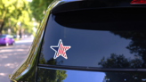 Star Stylized American Flag Sticker on a Rear Car Window (New) example
