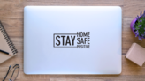 Stay Home Safe Positive Transfer Sticker on a Laptop (New) example