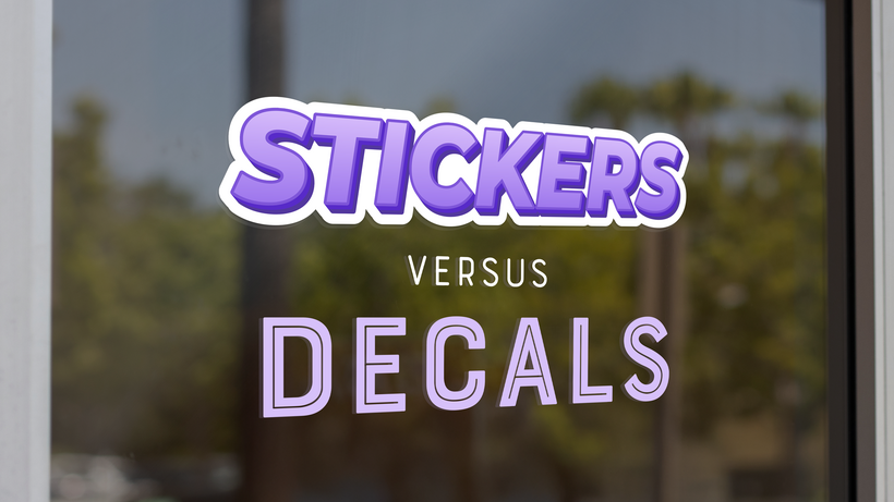 Examples of a sticker and a decal on a glass surface.