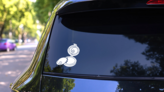 Stylish Compact Makeup Sticker on a Rear Car Window (New) example