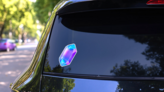 Stylized Magic Blue Gemstone Sticker on a Rear Car Window (New) example