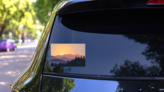 Sunrise Behind Mountains Sticker on a Rear Car Window (New) example