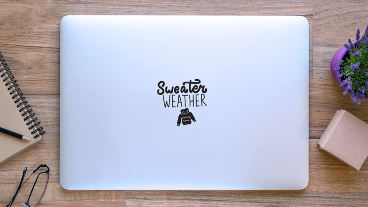 Sweater Weather Winter Lettering Sticker on a Laptop (New) example