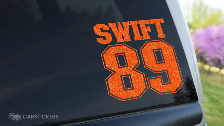Swift 89 Orange Glitter Sticker on Back Window of Vehicle