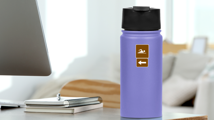 Swimming To The Left Sticker on a Water Bottle (New) example