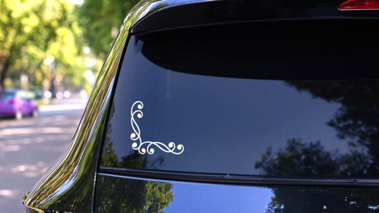 Swirly Decorative Corner Border Sticker on a Rear Car Window (New) example