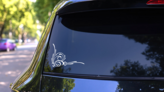 Swirly Decorative Corner Sticker on a Rear Car Window (New) example