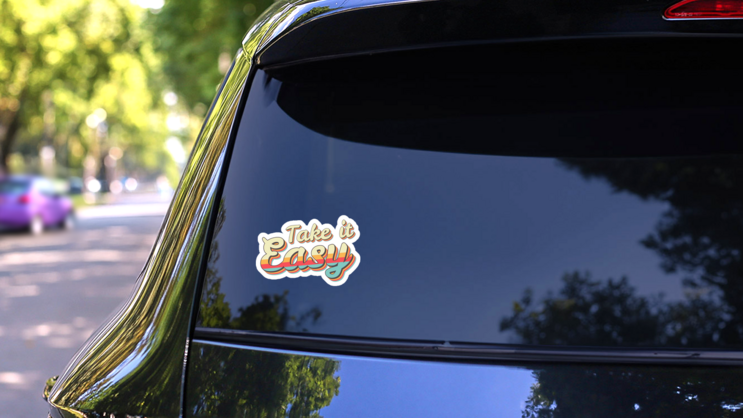 Take It Easy 70s Vintage Hawaii Lettering Sticker on a Rear Car Window (New) example