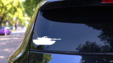 Tank With Long Antenna Sticker on a Rear Car Window (New) example