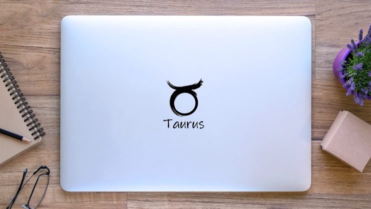Taurus Zodiac Symbol Lettering Sticker on a Laptop (New) example